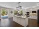 Well-lit kitchen with center island, stainless appliances, and lots of windows at 3428 Deer Oak Cir, Oviedo, FL 32766