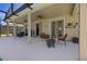 Spacious covered patio with outdoor seating, a fire pit, and easy access to the home's interior at 3428 Deer Oak Cir, Oviedo, FL 32766