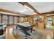 Recreational space with pool table, wood paneling, and exposed beams at 412 Stimson St, Orlando, FL 32839