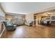 Spacious living room and dining room combo with wood floors, neutral walls, and natural light at 412 Stimson St, Orlando, FL 32839