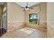 Inviting dining area with tile flooring, large window, and decorative chair railing at 4229 Settlers Ct, St Cloud, FL 34772