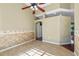 Spacious dining room featuring neutral walls and tile flooring with natural light beaming through at 4229 Settlers Ct, St Cloud, FL 34772