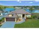Inviting single Gathering home featuring lush green lawn and beautiful water view at 4229 Settlers Ct, St Cloud, FL 34772