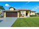 Charming home featuring a well-manicured lawn and a two-car garage at 4229 Settlers Ct, St Cloud, FL 34772
