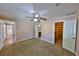 Spacious bedroom with carpet, ceiling fan, and ensuite bathroom at 426 S Lakemont Ave, Winter Park, FL 32792