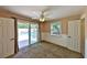 Bedroom with sliding doors leading to the pool area at 426 S Lakemont Ave, Winter Park, FL 32792