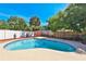 Relaxing backyard pool with mature trees and privacy fence is perfect for outdoor enjoyment at 426 S Lakemont Ave, Winter Park, FL 32792