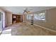 Light-filled sunroom with tile floors and view of the connected dining and kitchen areas at 426 S Lakemont Ave, Winter Park, FL 32792