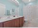Bathroom featuring dual sinks, and a shower/tub combination at 4918 Oakway Dr, St Cloud, FL 34771
