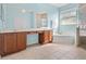 Spacious bathroom with a double vanity, a soaking tub, and a glass-enclosed shower at 4918 Oakway Dr, St Cloud, FL 34771