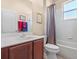 Functional bathroom with a vanity, ample lighting, and a shower-tub combination at 4918 Oakway Dr, St Cloud, FL 34771