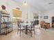 Cozy breakfast nook with tile floors, a round table, and bright natural light at 4918 Oakway Dr, St Cloud, FL 34771