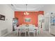Elegant dining room featuring a stylish light fixture, and decorative walls at 4918 Oakway Dr, St Cloud, FL 34771