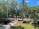 Community playground with modern equipment and mature trees, offering a shaded play area at 4918 Oakway Dr, St Cloud, FL 34771