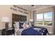 Themed bedroom with Star Wars decor, unique headboard, and window view at 5248 Stone Ridge Pl, St Cloud, FL 34771