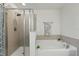 Close up of bathtub and shower in bathroom at 5892 Soter Ln, Windermere, FL 34786