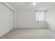 Bedroom featuring neutral carpet, closet, ceiling fan, and natural light at 5892 Soter Ln, Windermere, FL 34786