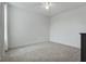 Bedroom featuring neutral carpet, ceiling fan, and large windows at 5892 Soter Ln, Windermere, FL 34786