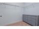 Walk-in closet with wire shelving and grey dresser at 5892 Soter Ln, Windermere, FL 34786