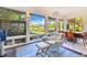 Bright living area with scenic views, featuring modern furnishings and stylish decor at 6082 Twin Lakes Dr, Oviedo, FL 32765