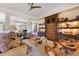 Inviting living room featuring custom built-ins, recessed lighting and an abundance of natural light at 6082 Twin Lakes Dr, Oviedo, FL 32765