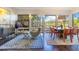 Bright living area with scenic views, featuring modern furnishings and stylish decor at 6082 Twin Lakes Dr, Oviedo, FL 32765