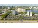 Scenic aerial shot capturing the community, surrounding landscape, and cityscape from above at 6165 Carrier Dr # 3602, Orlando, FL 32819
