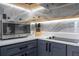 Stylish kitchen featuring stainless steel microwave and plenty of counterspace at 6165 Carrier Dr # 3602, Orlando, FL 32819