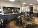 Spacious restaurant featuring tables, chairs, buffet, and views of the surrounding area at 6165 Carrier Dr # 3602, Orlando, FL 32819