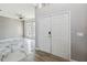 Grand foyer with marble floors, modern light fixtures, and a view into the adjacent living area at 6761 Scimitar Ave, Orlando, FL 32812