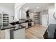 Modern kitchen with granite countertops, stainless steel appliances, and stylish backsplash at 6761 Scimitar Ave, Orlando, FL 32812