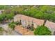 Aerial shot of the residential complex showcasing the building's architecture and surrounding green landscape at 692 Seabrook Ct # 103, Altamonte Springs, FL 32714