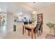 Bright dining area is conveniently located near the kitchen at 692 Seabrook Ct # 103, Altamonte Springs, FL 32714