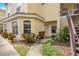 Charming exterior of a condo building with well-maintained landscaping and tiled roof at 692 Seabrook Ct # 103, Altamonte Springs, FL 32714