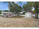 The backyard features a patio, storage shed, and fenced yard at 80 Lombardy Rd, Winter Springs, FL 32708