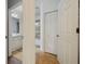Bright bathroom features a vanity with a sink, mirror, and a separate area with a shower and bathtub at 8180 Boat Hook Loop # 105, Windermere, FL 34786