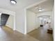 Clean and spacious hallway with neutral carpet and staircase at 8180 Boat Hook Loop # 105, Windermere, FL 34786