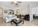 Open-concept living room with neutral walls, tile floors and comfortable seating at 8180 Boat Hook Loop # 105, Windermere, FL 34786