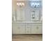 Bathroom features a double sink vanity with modern fixtures and ample storage space at 8225 Corkfield Ave, Orlando, FL 32832