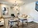 A cozy living room with neutral decor, comfortable seating, and stylish accents at 8225 Corkfield Ave, Orlando, FL 32832