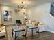 A cozy living room with neutral decor, comfortable seating, and stylish accents at 8225 Corkfield Ave, Orlando, FL 32832