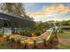 Backyard with path leading to pool and pond area at 835 Dyson Dr, Winter Springs, FL 32708