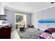 bedroom with gray carpet and view of the window at 835 Dyson Dr, Winter Springs, FL 32708