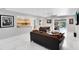 Open-concept living room with a seamless flow to kitchen and an inviting pool view at 835 Dyson Dr, Winter Springs, FL 32708