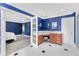 Main bath with vanity, dressing table, and open doorway to main bedroom at 835 Dyson Dr, Winter Springs, FL 32708