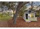 Backyard shed located near pond and fire pit area at 835 Dyson Dr, Winter Springs, FL 32708