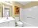 Well-maintained bathroom featuring a tub/shower combination and vanity with good lighting at 8602 Se 133Rd Ln, Summerfield, FL 34491