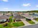 Beautiful single-story home featuring a well-kept lawn and attractive landscaping in a tranquil neighborhood setting at 8602 Se 133Rd Ln, Summerfield, FL 34491