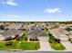Charming single-story home with a well-manicured lawn and beautiful landscaping in a quiet neighborhood at 8602 Se 133Rd Ln, Summerfield, FL 34491