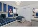 ' bedroom with dual beds, soft carpet, fan, and closet at 8892 Bengal Ct, Kissimmee, FL 34747